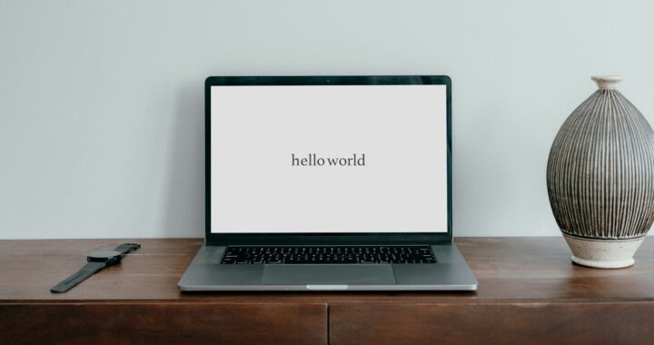 laptop that says Hello World.