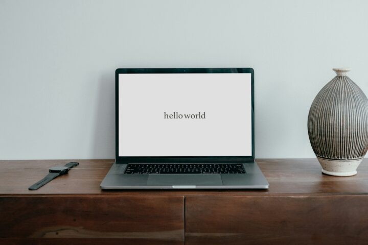 laptop that says Hello World.