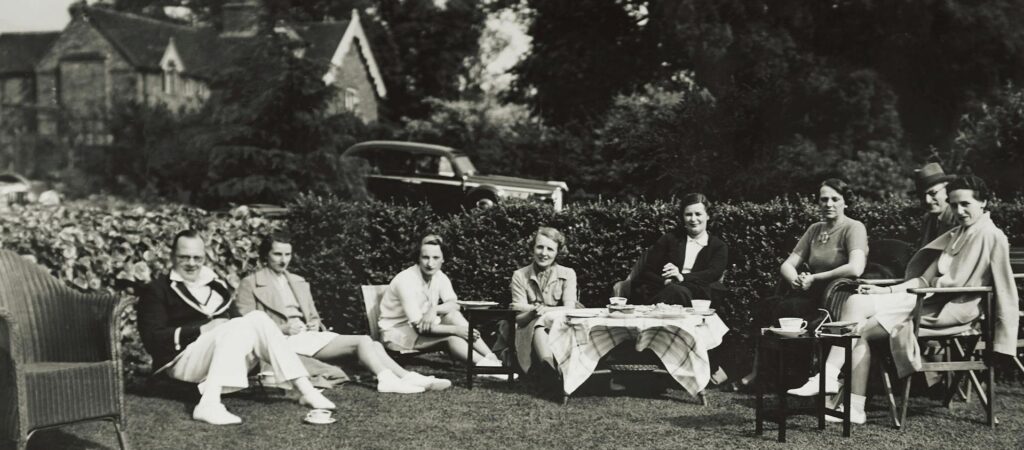 people at an outdoor party in the past