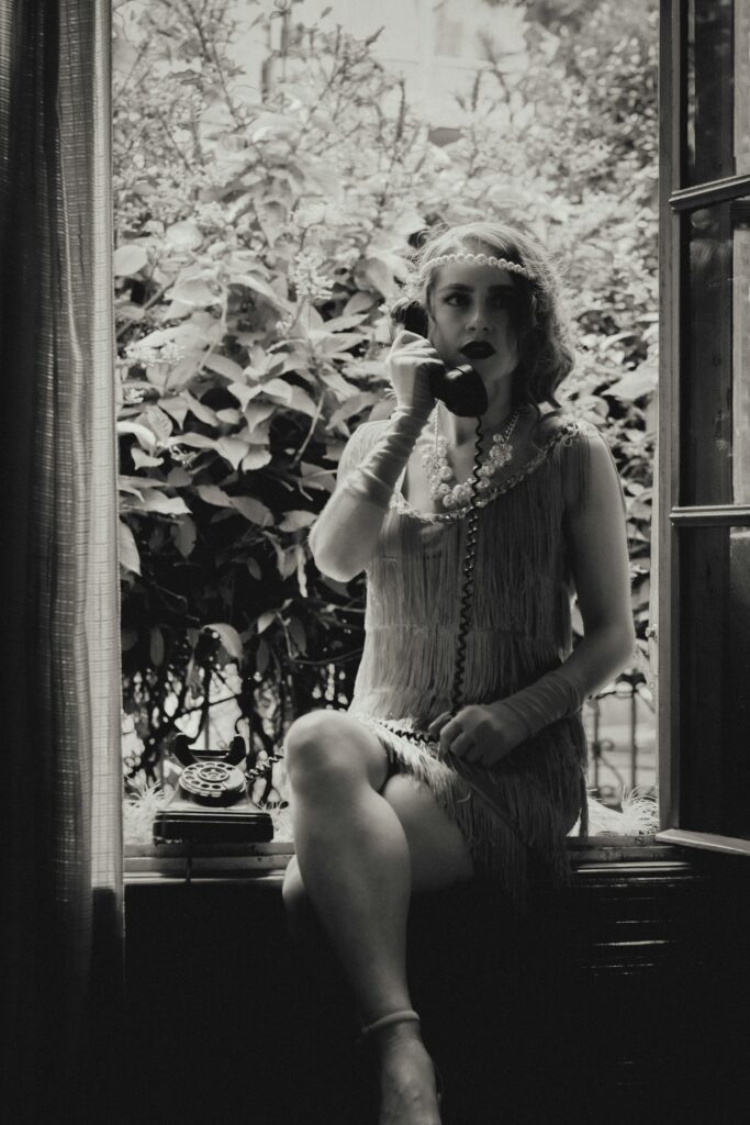 flapper woman with corded phone