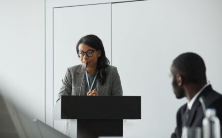 reading at podium